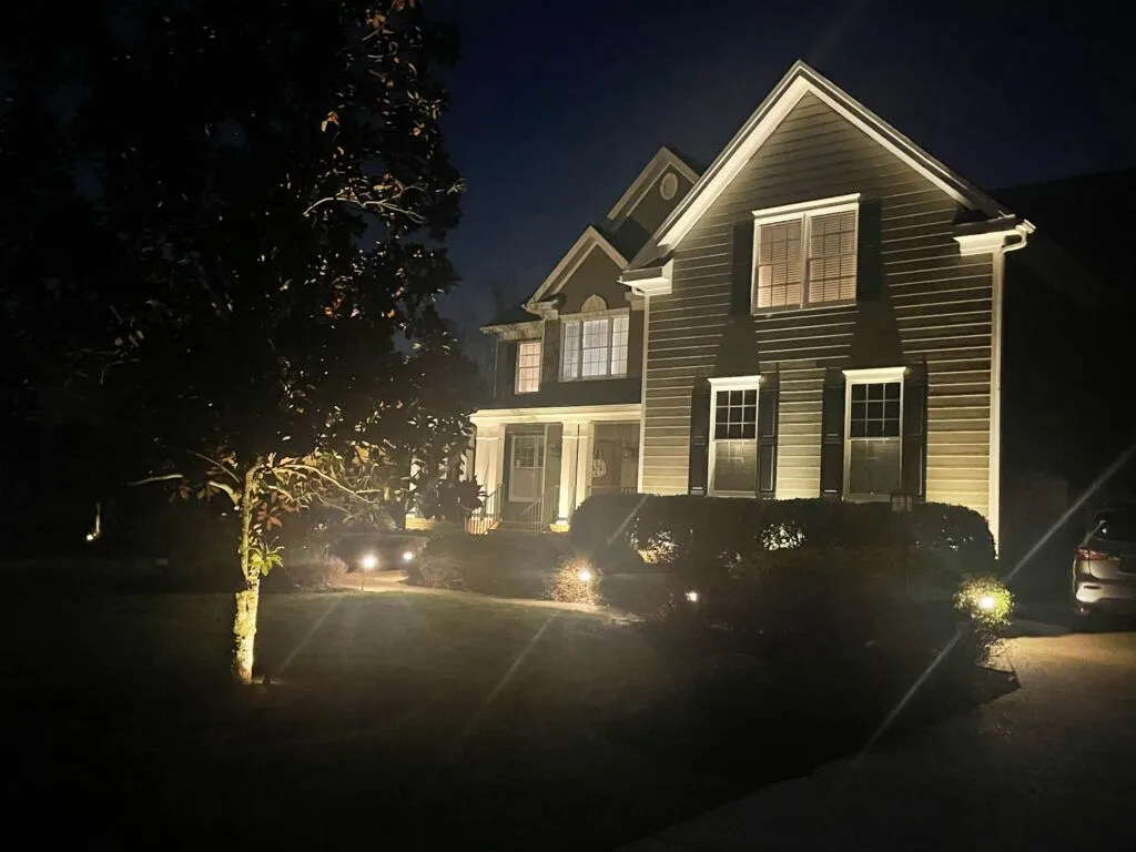 Landscape lighting on a multi-story home