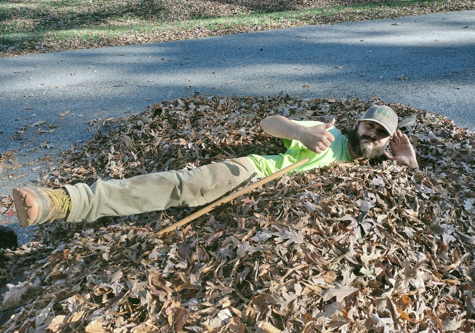 green-side-up-landscaping-leaves-thumbsup